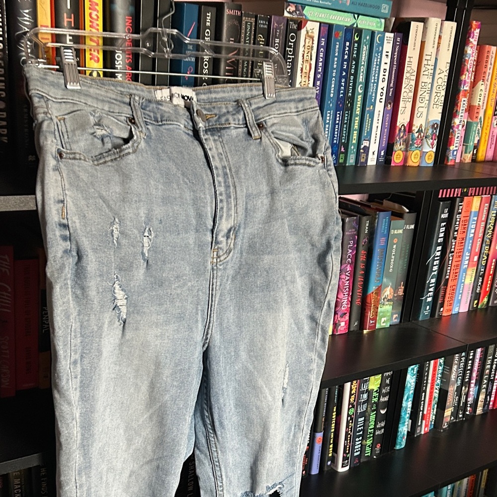 Woman’s Light Blue Distressed Jeans